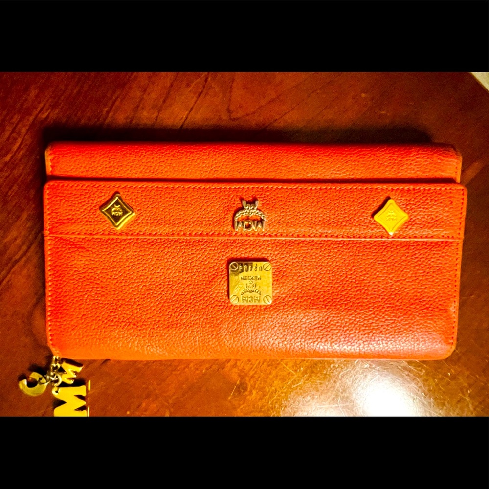 MCM Authentic long wallet with MCM logo chain, gently used very good condition.